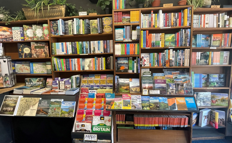 Display of books on shelves and tables