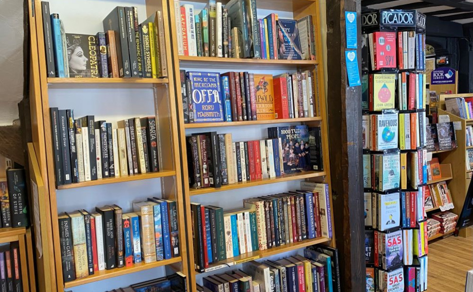 History section of the bookshop with books on shelves